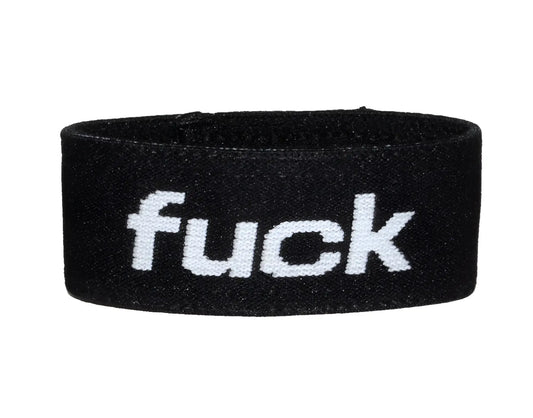 Wildmant verbal max cock-ring black elastic wristband with white embroidered fuck text visible on the front side