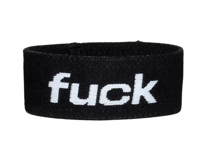Black elastic band with the word "fuck" in white text on the front.