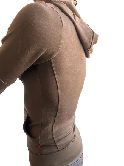 A taupe mid-weight luxury-fleece form-fit hoodie with sleek seams from the winter collection for yoga and track