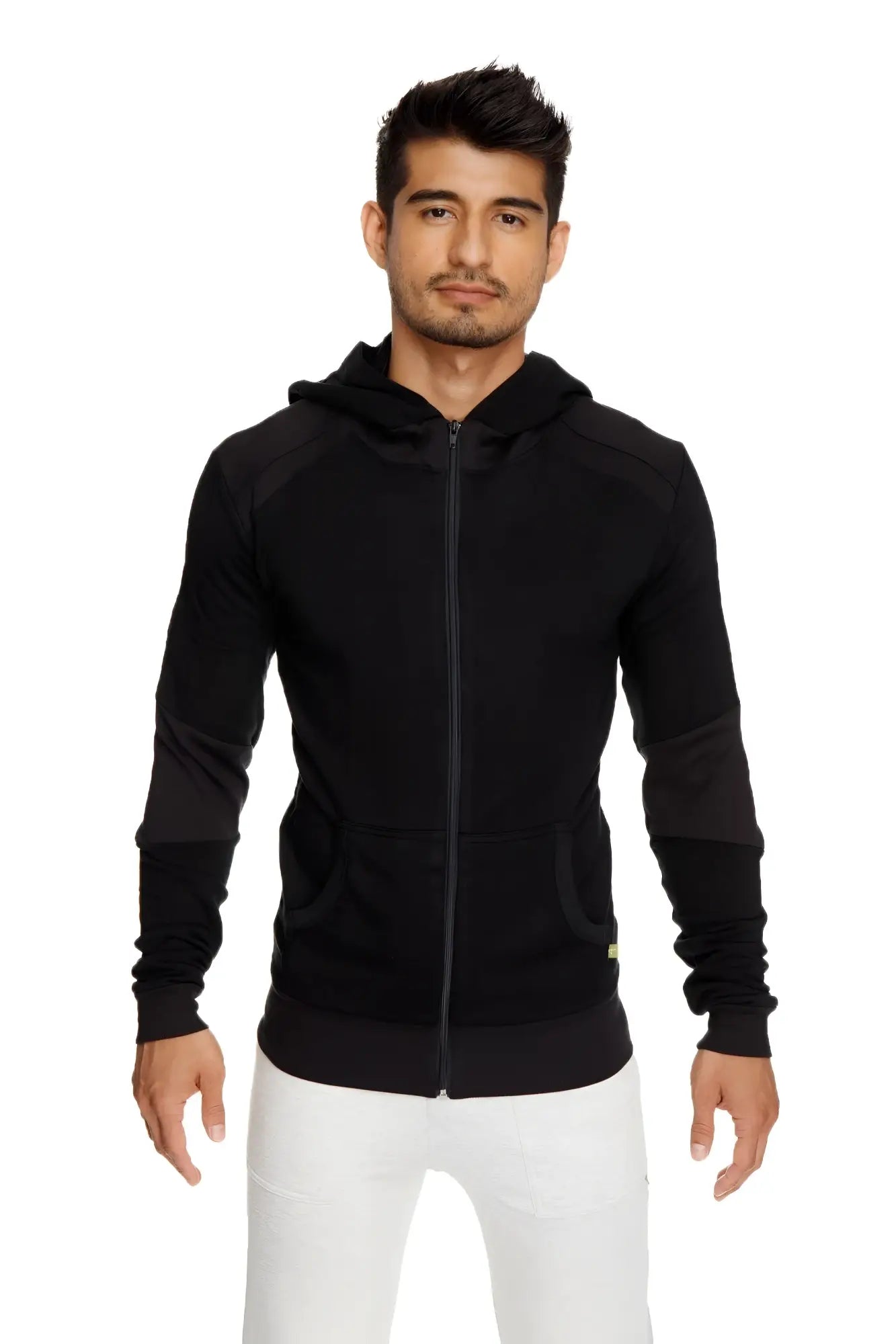 Black mid-weight luxury-fleece zip-up hoodie with subtle contrast sleeve panels and yellow tag for yoga and track use
