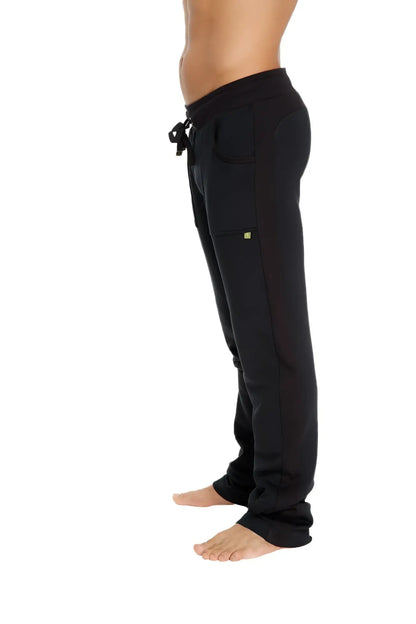 Black mid-weight luxury-fleece sweatpants with drawstring and lime green logo on thigh from winter collection