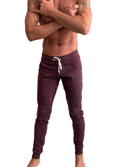 Winter edition luxury-fleece long cuffed jogger pants in dark purple with white drawstring and side pockets