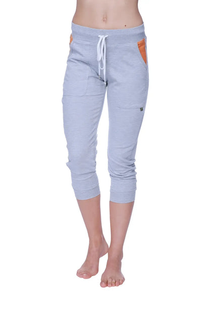 Women’s heather grey 3/4 cuffed capri yoga pants with orange side pockets and white drawstring waistband