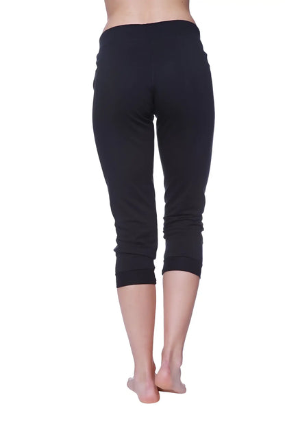 Women’s solid black 3/4 cuffed capri yoga pant with smooth stretchy fabric and elastic waistband