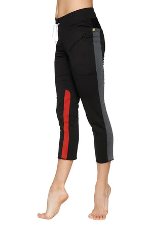 Women’s black capri yoga pants with gray and red side stripes, elastic waistband, white drawstring, zipper pockets
