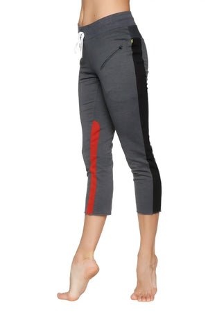 Women’s charcoal gray 4/5 length capri yoga pants with black and red side stripes and white drawstring waistband