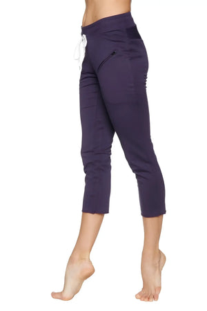 Navy blue high-waisted 4/5 length capri yoga pants with white drawstring and side zipper pockets for women