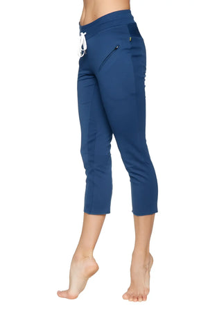 Women’s royal blue 4/5 length zipper pocket capri yoga pants with white drawstring waistband and side pockets