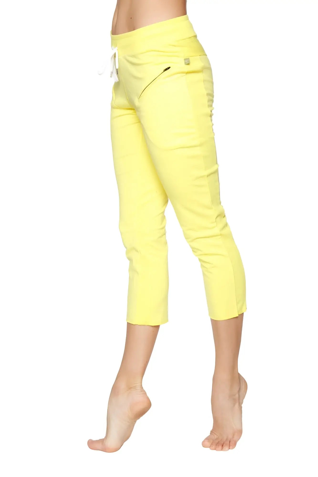 Women’s 4 5 length zipper pocket capri yoga pant in bright yellow with high waist white drawstring and side zipper detail