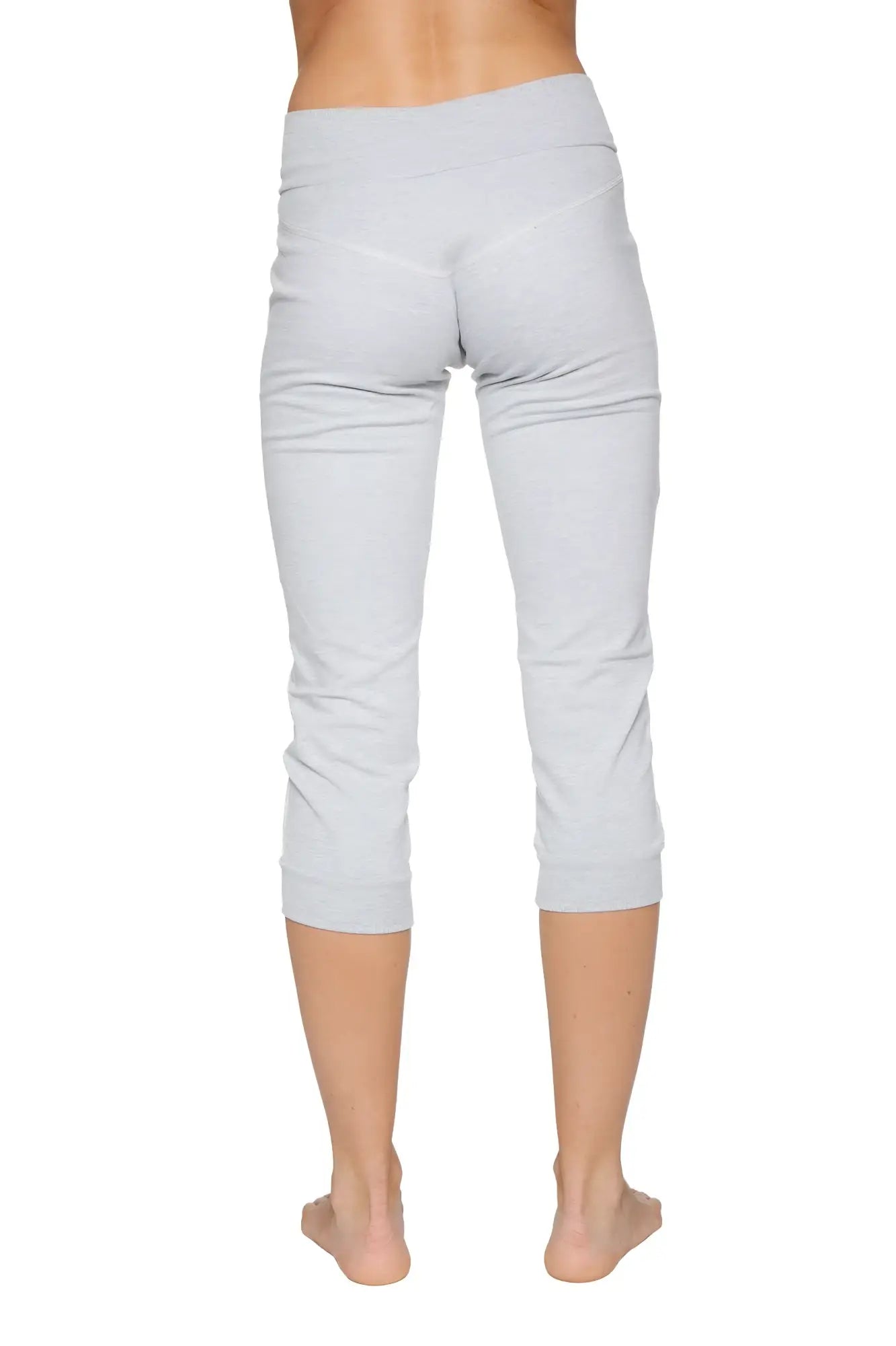 Women’s heather grey cuffed jogger yoga pants in soft stretchy fabric with elastic waistband and capri length