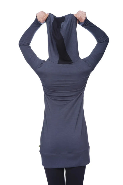 Back view of women’s long body hoodie top in charcoal with black inner lining and subtle ruching at the back