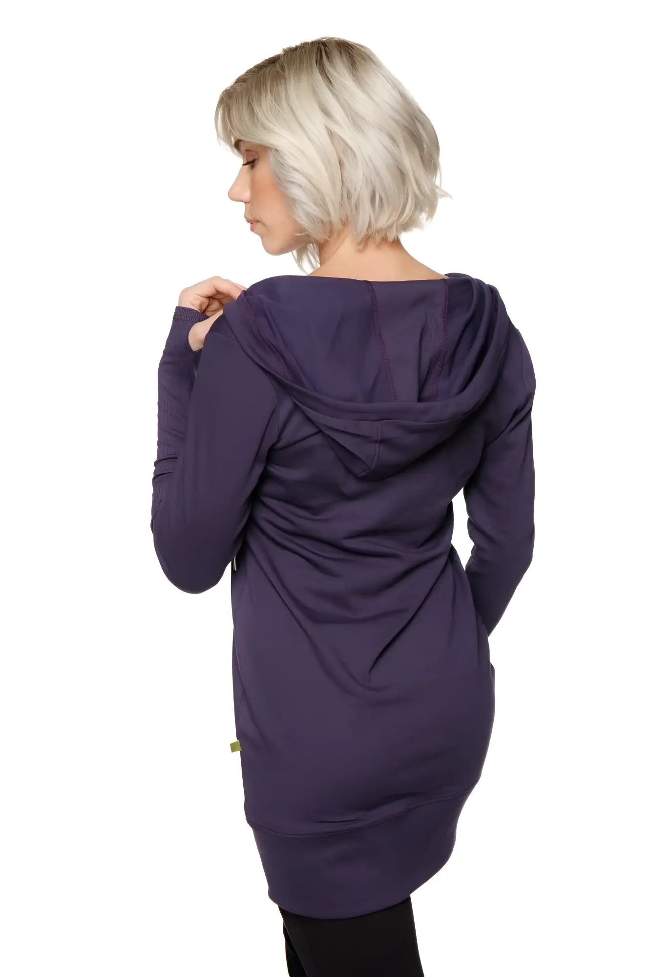 Women’s long body hoodie top in eggplant purple with soft draping fabric and relaxed fit long sleeves