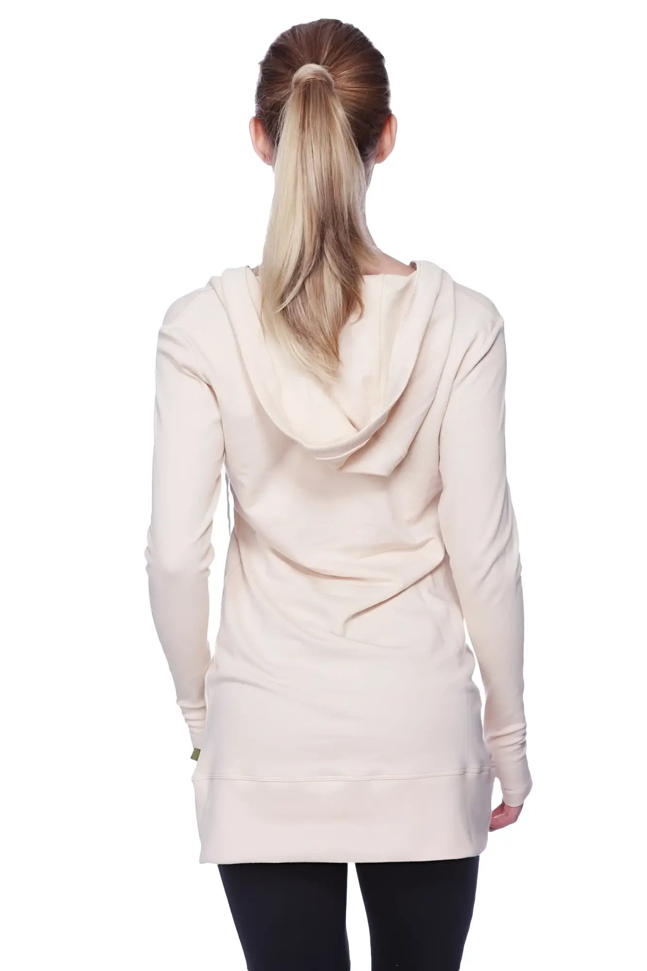 Cream-colored women’s long body hoodie top with hood long sleeves relaxed fit and ribbed cuffs in solid sand camel beige