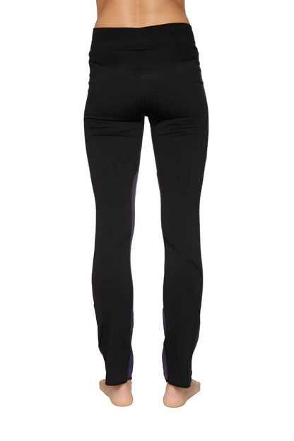 Women’s organic boyfriend yoga training pant in black high-waisted leggings with subtle purple side panels
