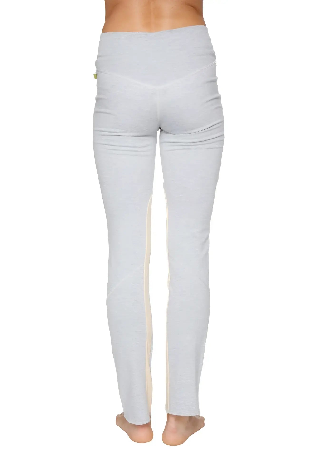 Women’s organic light gray high waisted yoga training pants with subtle vertical seam detail down the outer leg