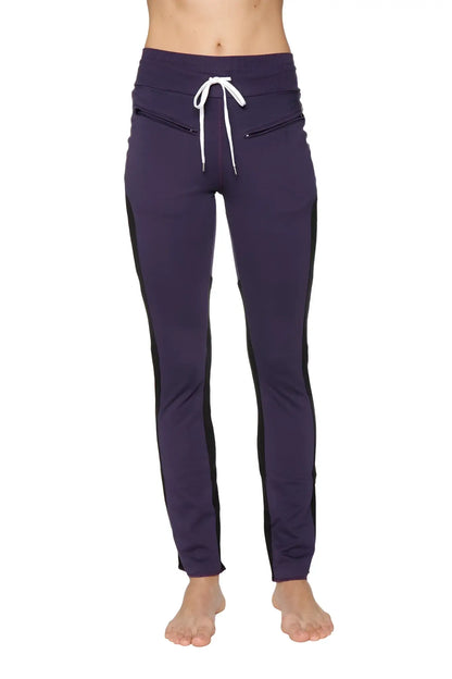 Women’s organic boyfriend yoga training pant in navy blue with black side panels and white drawstring waistband