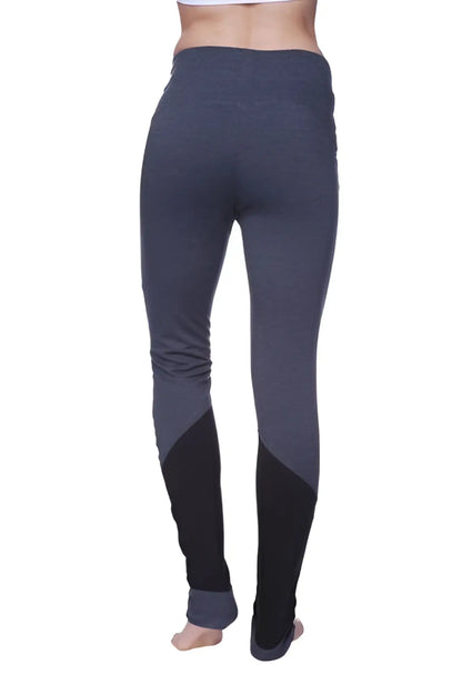 Women’s performance yoga pant with dark gray and black color-blocked snug fit leggings featuring contrasting lower leg panels