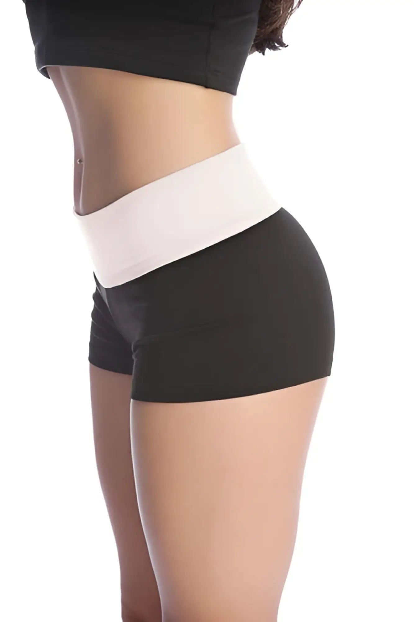 Womens yoga transition shorts in black and white with wide contrasting waistband for athletic comfort