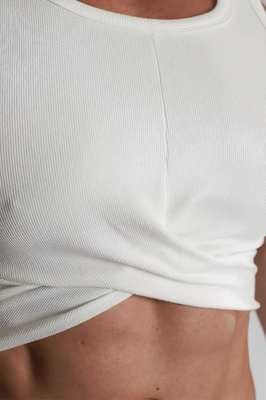 White ribbed crop top with round neckline and twisted hemline perfect for casual summer wear