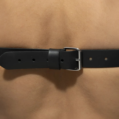 Black leather belt with silver-toned buckle x-cross leather harness featuring durable leather and stylish hardware