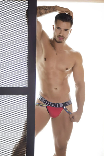 Red and black microfiber pride jockstrap with bold homemen x logo on waistband xtremen 91084