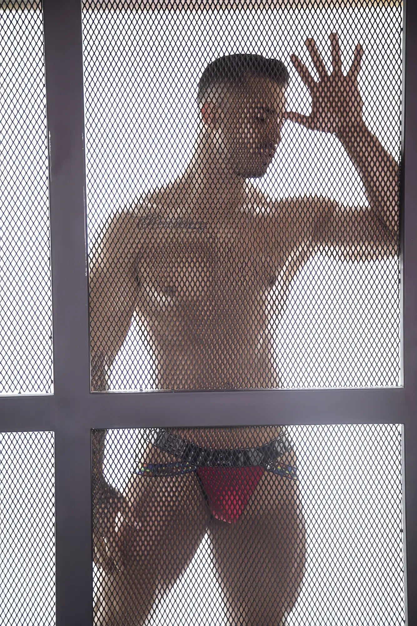 Xtremen 91084 microfiber pride jockstrap in red with red triangular briefs and black patterned waistband