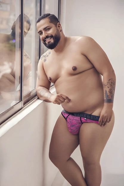 Pink patterned xtremen 91100x microfiber mesh briefs with black trim and brand logo on the waistband