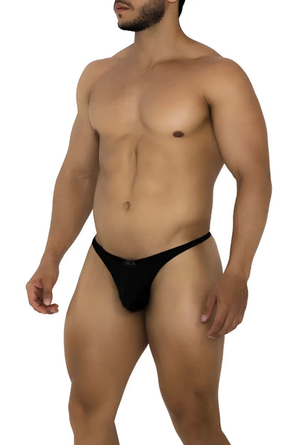 Black Xtremen 91185 mesh thong with form-fitting design and subtle brand logo on the waistband showing the back side