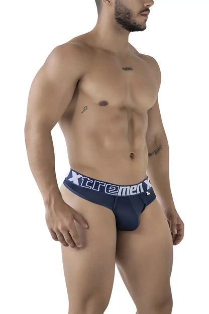 Navy blue Xtremen 91208B microfiber men’s briefs with white waistband lettering showing the back side