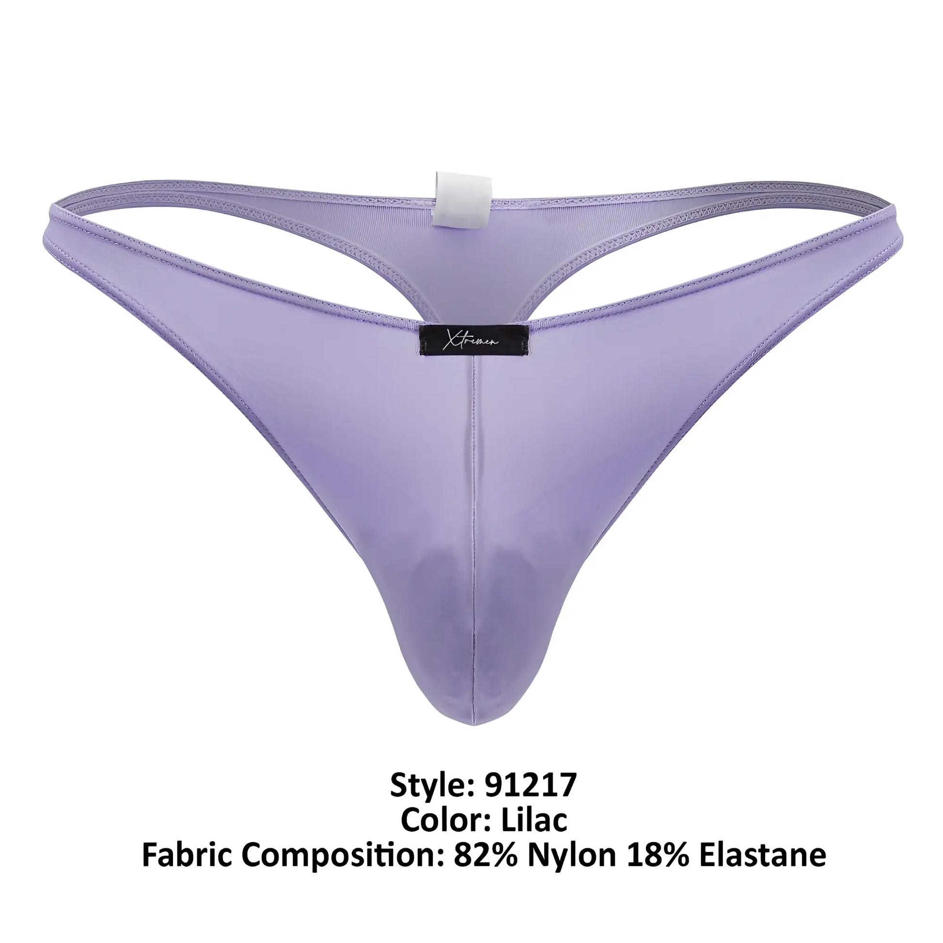 Lilac-colored sheer nylon and elastane Xtremen 91217 microfiber thong with black brand tag visible on front side