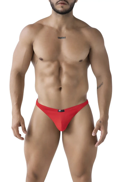 Red Xtremen 91223 microfiber thongs with mesh fabric and a black brand tag on the waistband