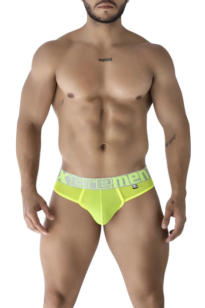 Bright neon yellow microfiber men’s briefs with matching xtremen elastic waistband in gray lettering