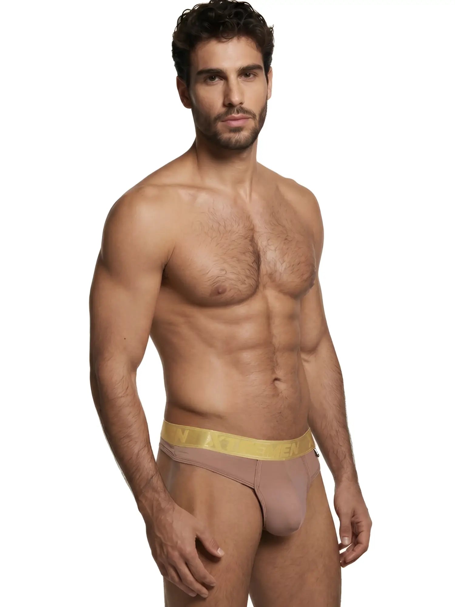 Xtremen beige thong with a metallic gold branded waistband on a muscular man.