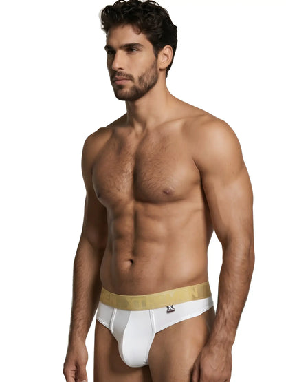 Xtremen white thong featuring a metallic gold logo waistband with a smooth, fitted fabric finish.