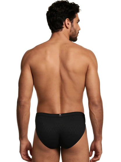 Xtremen men's black brief with a subtle honeycomb textured pattern, shown from the back against a white background.