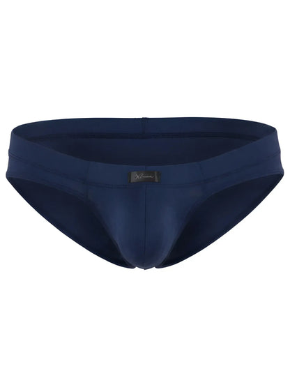 Xtremen navy blue men’s brief with a contoured pouch, matte fabric finish, and a center brand logo tab.