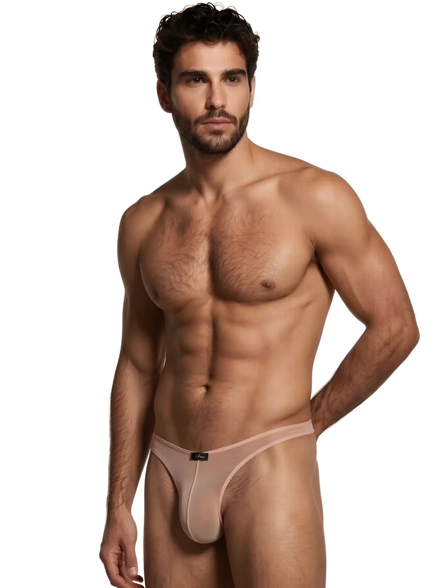 Xtremen beige sheer mesh thong with a form-fitting pouch and minimalist design on a male model.