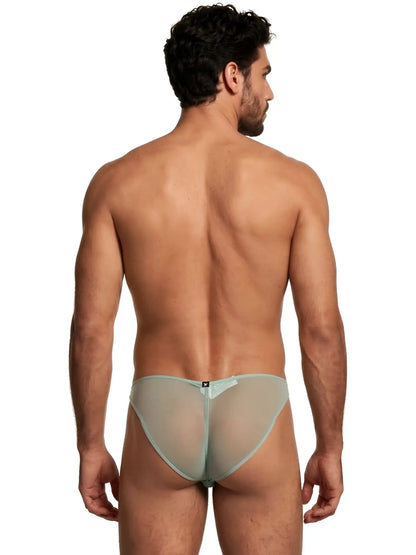 Xtremen sage green sheer bikini brief on a man viewed from behind, showing a thin, translucent fabric fit.