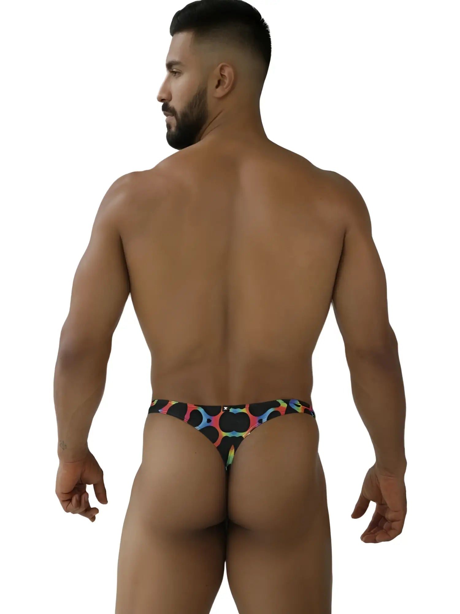 Xtremen 91284 printed microfiber thong in black with vibrant rainbow circular patterns and mushroom color accents