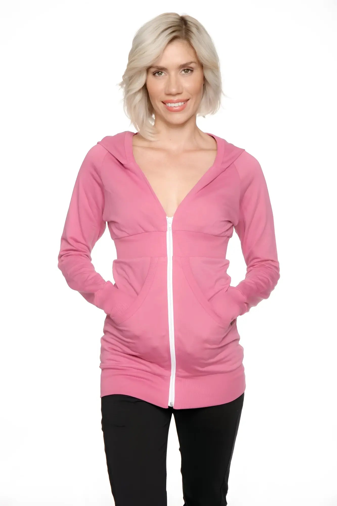A soft pink zip-up long body travel-ready hoodie with white zipper and front pockets for comfortable wear