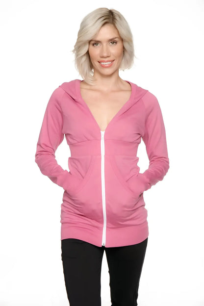 A soft pink zip-up long body travel-ready hoodie with white zipper and front pockets for comfortable wear