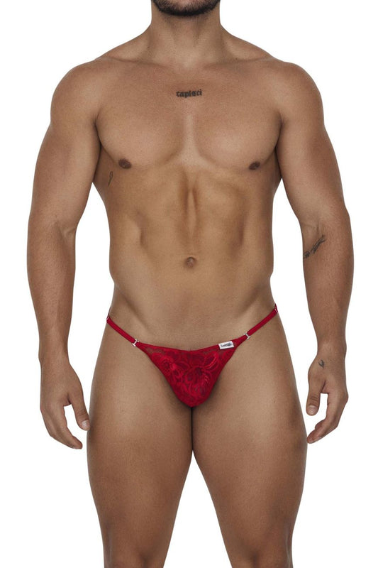 Red lace thong with a small white brand tag on the waistband from CandyMan 99685 lace thongs in red color