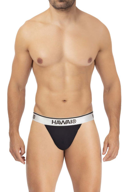 Black hawai brand microfiber thongs in black with white waistband featuring logo visible from the back side