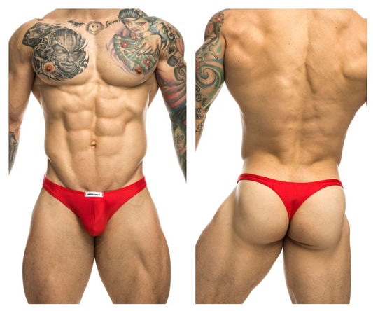 Red athletic briefs with a white justin simon brand tag on the waistband in classic xsj03 style