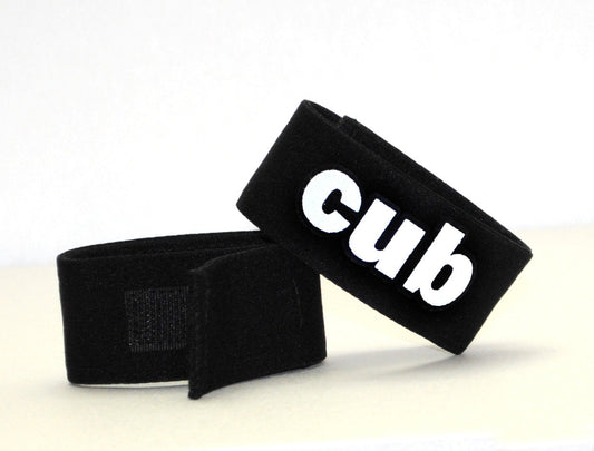 Black velour wristband with white cub logo for wildmant fetish max cock ring cub product