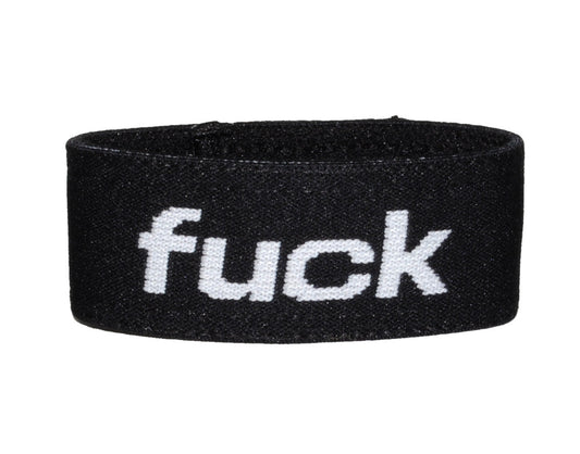 Wildmant verbal max cock-ring black elastic wristband with white embroidered fuck text visible on the front side