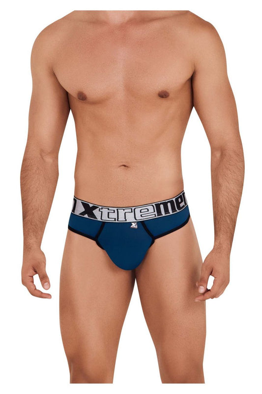 Blue xtreme microfiber briefs in petrol color with white and black logo band visible from the back side